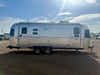
Used 2024 Airstream Trade Wind 25FB Travel Trailer - Terracotta Exterior - River Oak Interior - VIN: 1STJVYJ27RJ573006 - Stock #RP1005