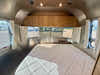 
Used 2024 Airstream Trade Wind 25FB Travel Trailer - Terracotta Exterior - River Oak Interior - VIN: 1STJVYJ27RJ573006 - Stock #RP1005