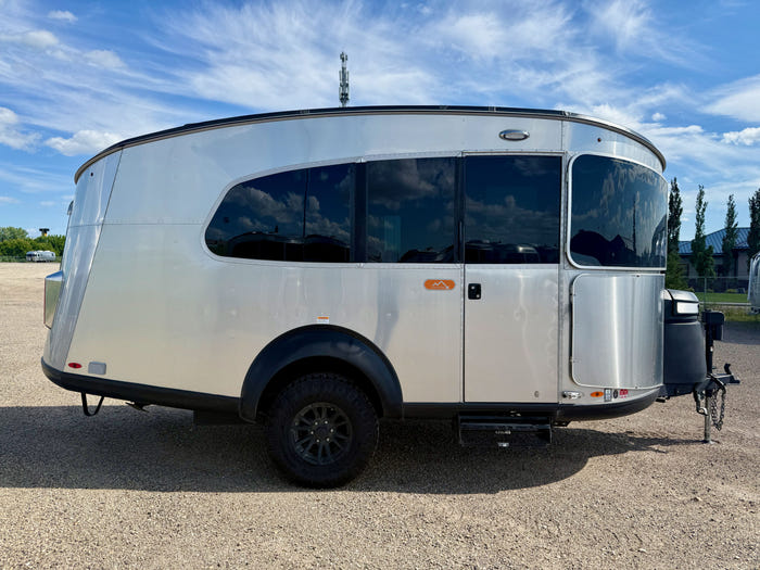 
Used 2024 Airstream Basecamp 20X Travel Trailer - Alpine Lake Exterior - Pinball Interior - VIN: 1SMG4DD24RJ209350 - Stock #RP1005A