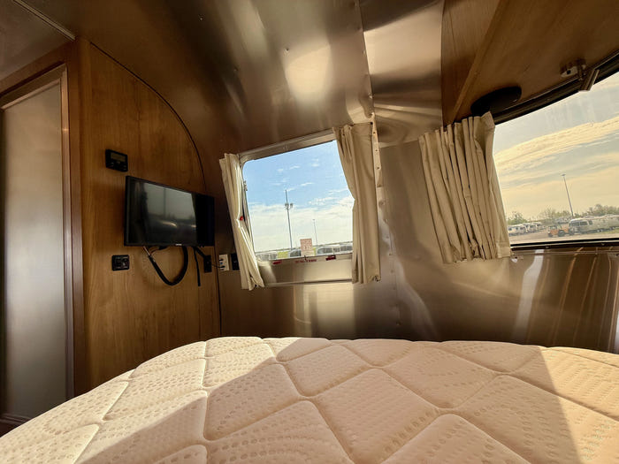 
Used 2024 Airstream Trade Wind 25FB Travel Trailer - Terracotta Exterior - River Oak Interior - VIN: 1STJVYJ27RJ573006 - Stock #RP1005