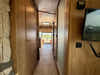 
Used 2024 Airstream Trade Wind 25FB Travel Trailer - Terracotta Exterior - River Oak Interior - VIN: 1STJVYJ27RJ573006 - Stock #RP1005