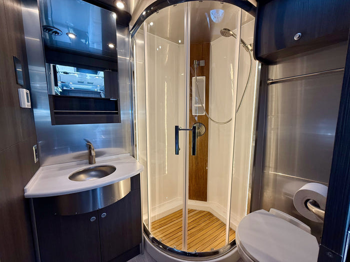
Used 2021 Airstream Atlas MURPHY Suite Touring Coach - Silver Exterior - Lux White Interior - VIN: 1B9KUWH22MJ306470 - Stock #RC1000