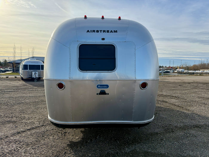
New 2026 Airstream Bambi 22FB Travel Trailer - Ocean Exterior - White Cypress Interior - VIN: 1STVMAF10TJ577188 - Stock #R60004