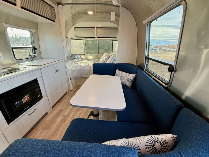 
New 2026 Airstream Bambi 22FB Travel Trailer - Ocean Exterior - White Cypress Interior - VIN: 1STVMAF10TJ577188 - Stock #R60004