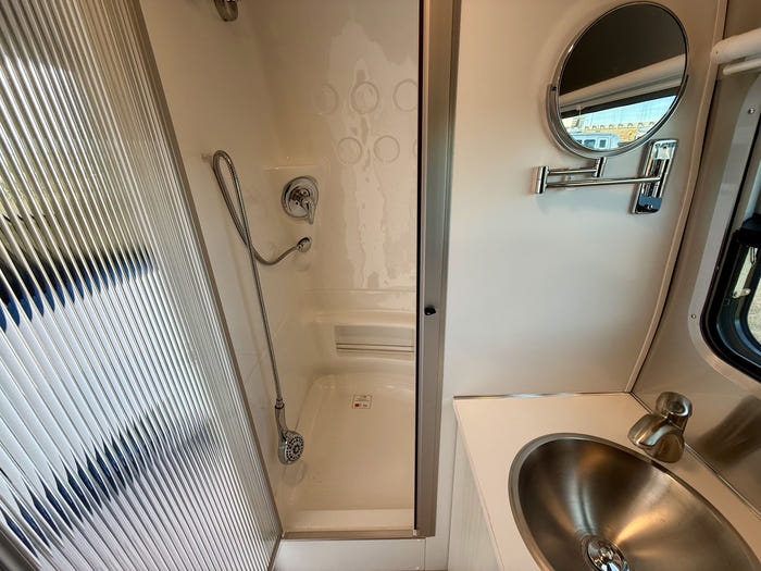 
New 2026 Airstream Bambi 22FB Travel Trailer - Ocean Exterior - White Cypress Interior - VIN: 1STVMAF10TJ577188 - Stock #R60004