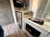 
New 2026 Airstream Bambi 22FB Travel Trailer - Ocean Exterior - White Cypress Interior - VIN: 1STVMAF10TJ577188 - Stock #R60004