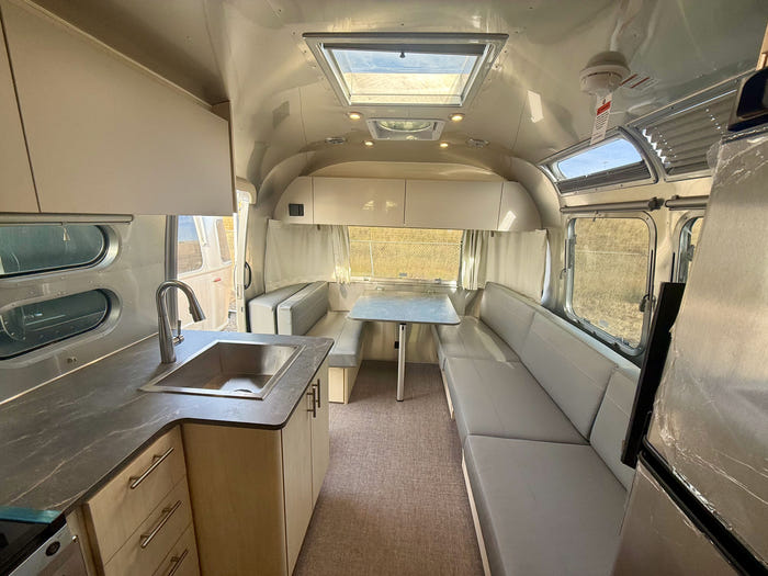 
New 2026 Airstream Flying Cloud 25FB Travel Trailer - Seattle Mist Exterior - Sunlit Maple Interior - VIN: 1STJ9YJ27TJ579965 - Stock #R60031
