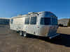 
New 2026 Airstream Globetrotter 27FB Travel Trailer - Dublin Slate (D/D) Exterior - Black Walnut Interior - VIN: 1STTNYL20TJ579971 - Stock #R60033