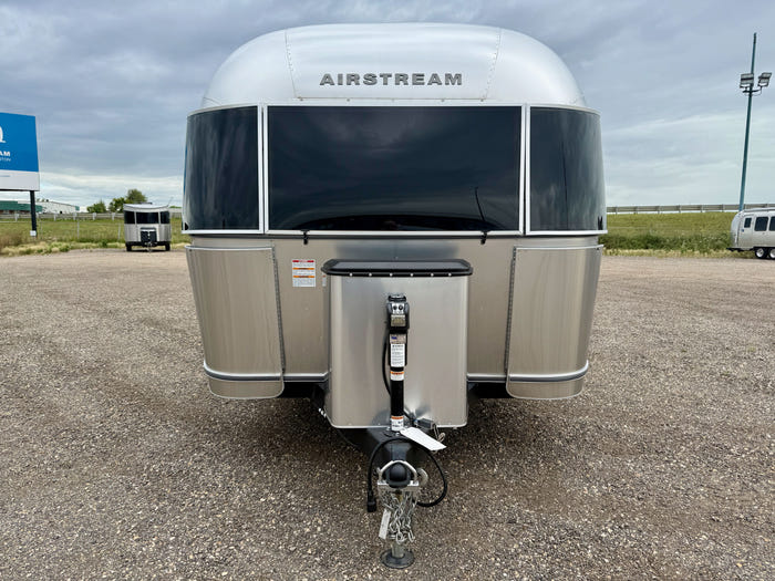 
New 2026 Airstream Trade Wind 25FBT Travel Trailer - Fieldstone Exterior - River Oak Interior - VIN: 1STJVYJ25TJ579989 - Stock #R60029