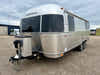 
New 2026 Airstream Trade Wind 25FBT Travel Trailer - Fieldstone Exterior - River Oak Interior - VIN: 1STJVYJ25TJ579989 - Stock #R60029