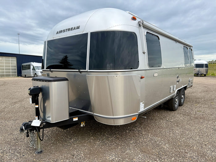 
New 2026 Airstream Trade Wind 25FBT Travel Trailer - Fieldstone Exterior - River Oak Interior - VIN: 1STJVYJ25TJ579989 - Stock #R60029