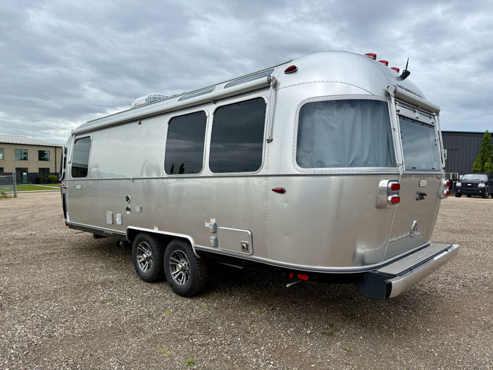 
New 2026 Airstream Trade Wind 25FBT Travel Trailer - Fieldstone Exterior - River Oak Interior - VIN: 1STJVYJ25TJ579989 - Stock #R60029