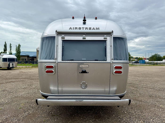 
New 2026 Airstream Trade Wind 25FBT Travel Trailer - Fieldstone Exterior - River Oak Interior - VIN: 1STJVYJ25TJ579989 - Stock #R60029