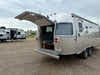 
New 2026 Airstream Trade Wind 25FBT Travel Trailer - Fieldstone Exterior - River Oak Interior - VIN: 1STJVYJ25TJ579989 - Stock #R60029
