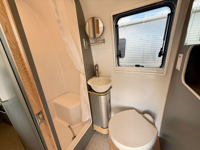 
New 2027 Airstream World Traveler 22RB Travel Trailer - Shoreline Exterior - Tailored Linen Interior - VIN: 1STGHTF17VJ580469 - Stock #R70001