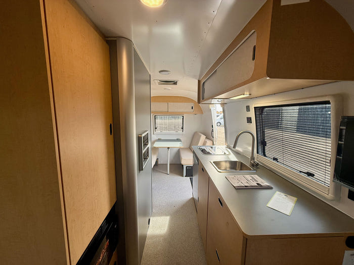 
New 2027 Airstream World Traveler 22RB Travel Trailer - Shoreline Exterior - Tailored Linen Interior - VIN: 1STGHTF17VJ580469 - Stock #R70001