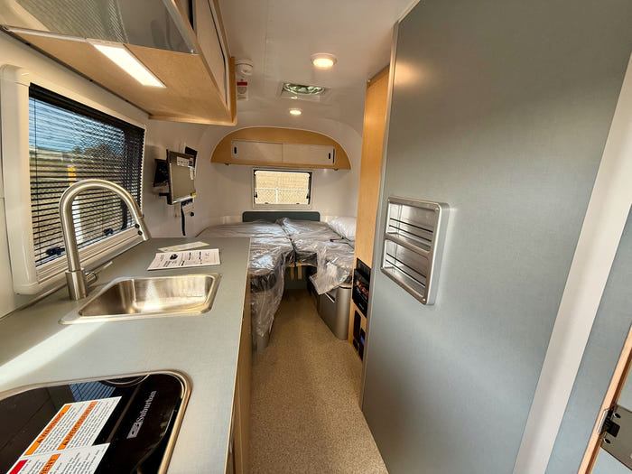 
New 2027 Airstream World Traveler 22RB Travel Trailer - Shoreline Exterior - Tailored Linen Interior - VIN: 1STGHTF17VJ580469 - Stock #R70001
